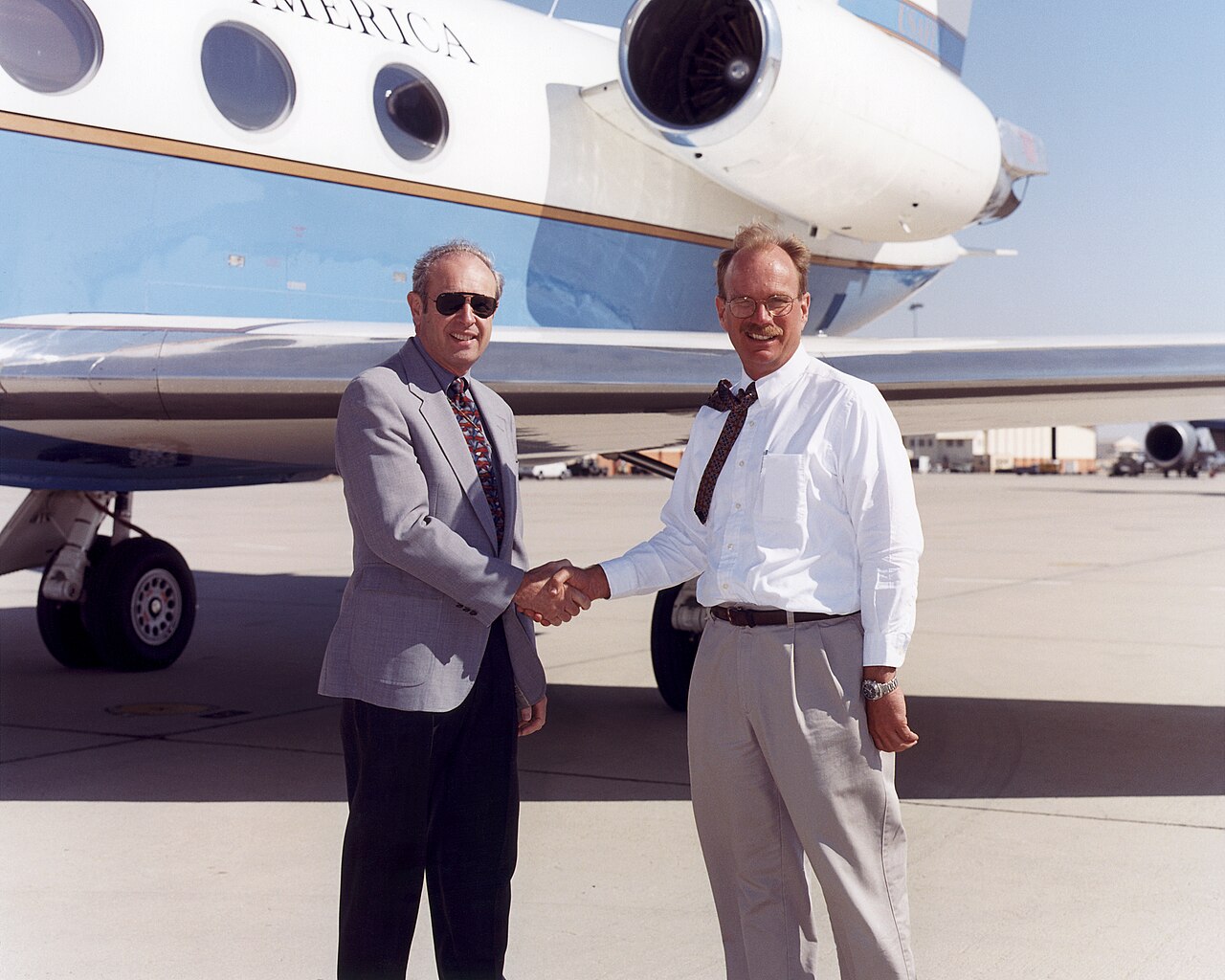 Meta Safety Director Hands OpenClaw AI Agents Access to Her Emails — Bob Meyer (right), acting deputy director of NASA Dryden, shakes hands with Les Bordelon, executive director of Edwards Air Force Base (EC02-0221-6)
